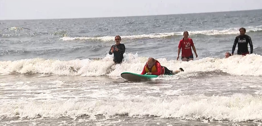 Ed Newell surfing